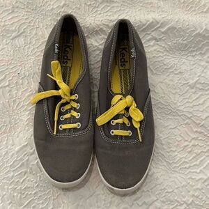 Gray and yellow Keds